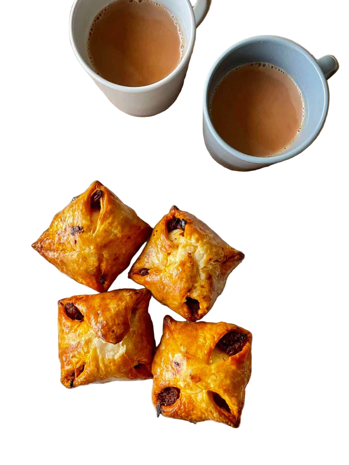 “Freshly baked Indian egg puffs – flaky pastry filled with spiced egg and onions from Fairmart Hot Counter UK.”